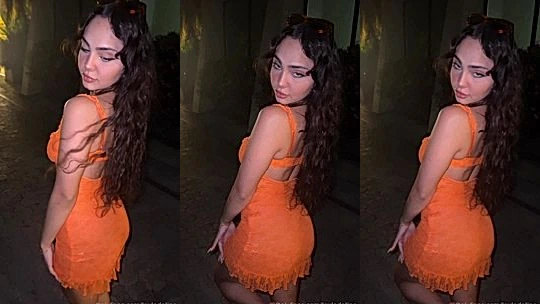 layladeline showing off her tight orange dress