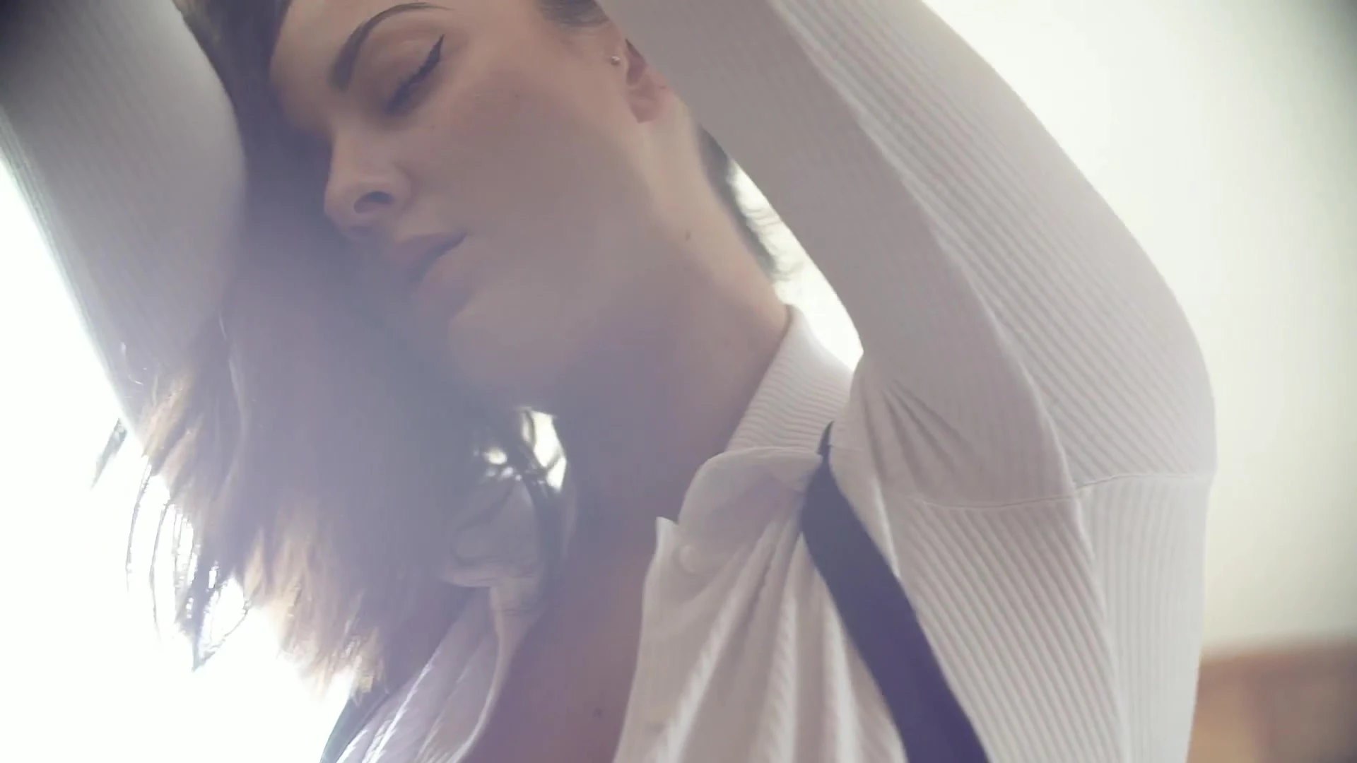 Joey Fisher teasing her big tits in the sunlight