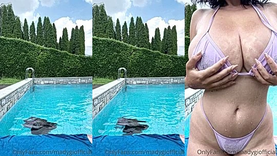 Mady Gio teasing her big tits coming out of the pool