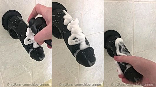 Okichloeo jerking a black wall dildo