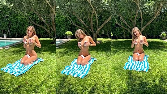 Ppwyang teasing her naked body while sunbathing