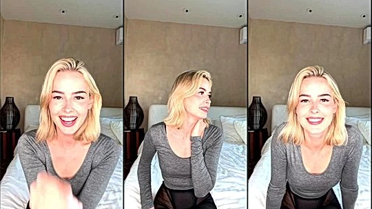 Elena Kamperi teasing her tits in her black bra