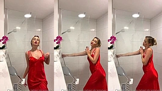 Elena Kamperi teasing in red silk gown
