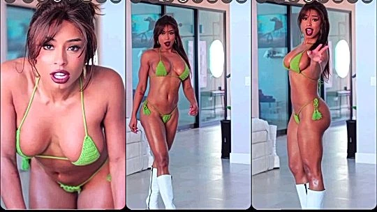 Qimmah Russo teasing in her green bikini
