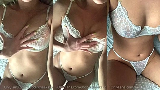 Mady Gio teasing her big tits in white laced lingerie