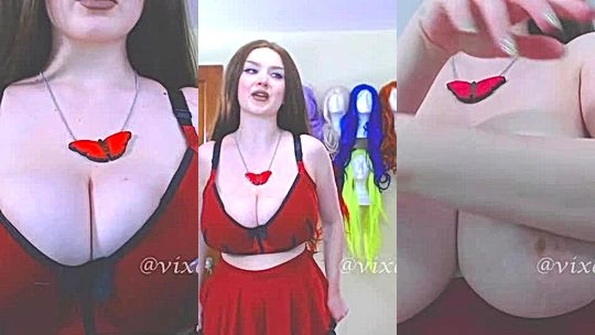 Vixen Virago teasing her big boobs in red lingerie