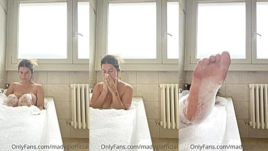 Horny Chick Mady Gio teasing her feet in the bathtub