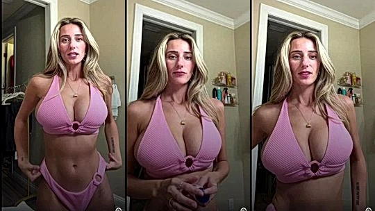 Horny Slut Madeline Hope teasing her big boobies in pink lingerie