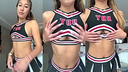 Ppwyang teasing in her cheerleader outfit