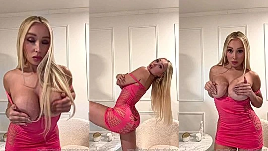 Daniella Chavez playing with her huge tits in the bathroom mirror