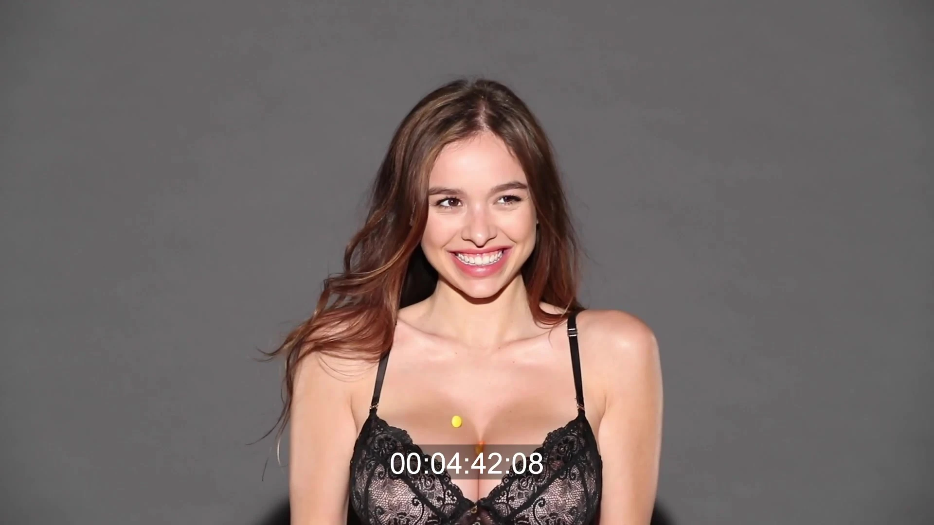 Sophie Mudd teasing her big tits in black laced lingerie