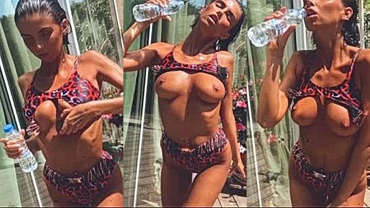 Laura Giraudi pouring water on her sweaty tits! DankFap