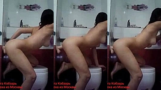 Olga Kobzar fucking a wall dildo in bathroom
