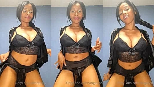 Angelysc showing off her big boobs in black laced lingerie