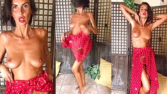 hot girl Laura Giraudi sexy striptease from her red dress