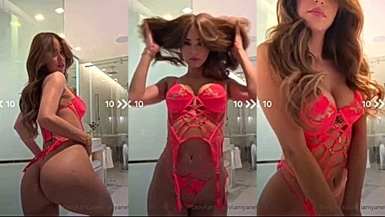 Yanet Garcia showing off her big tits in pink lingerie
