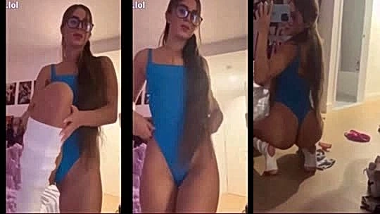 Emarrb teasing her hot body in blue swimsuit