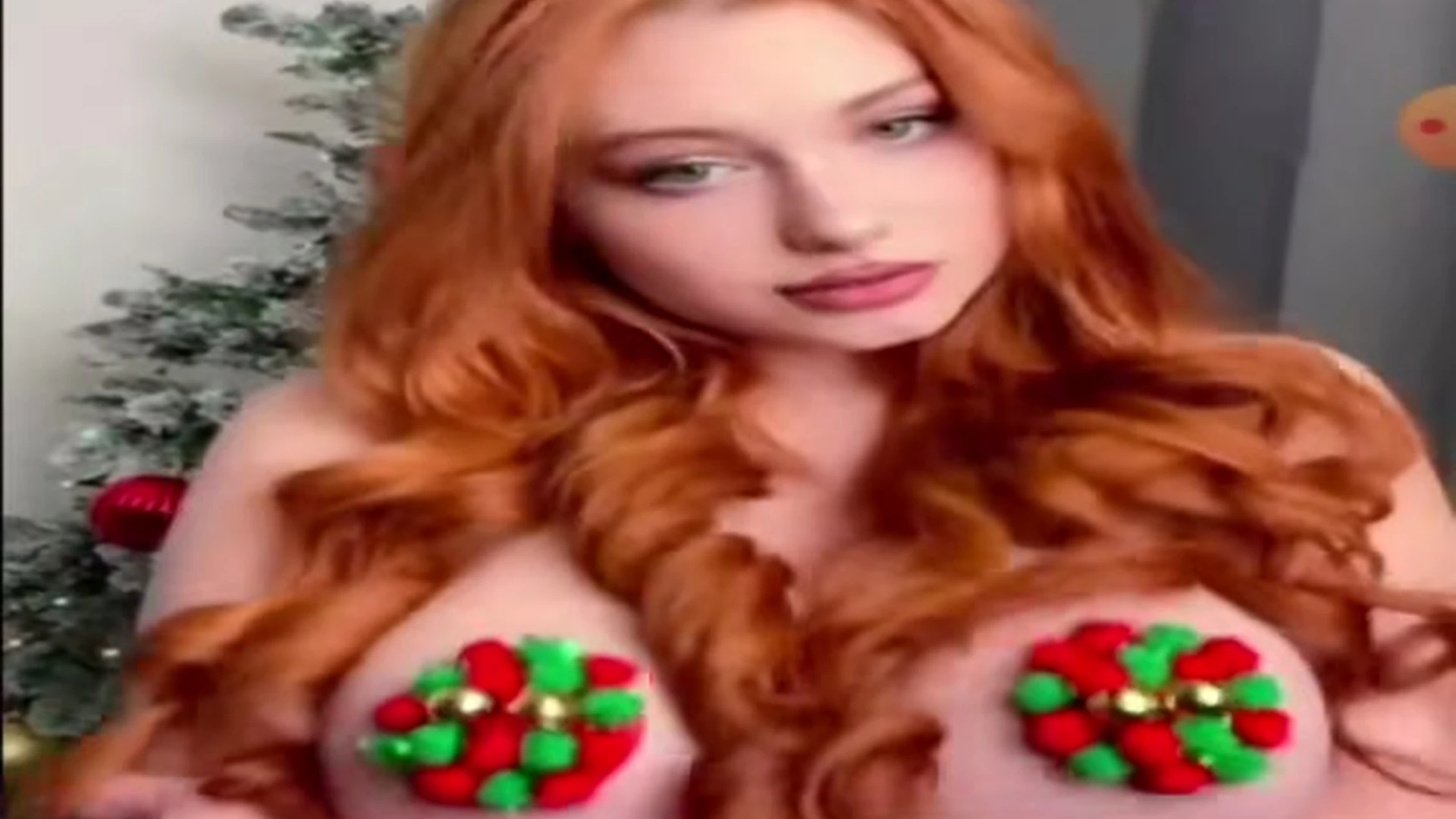 Blackwidof teasing her tits with chistmas nipple pasties